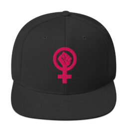 Black snapback hat with a pink feminist fist symbol embroidered on the front.